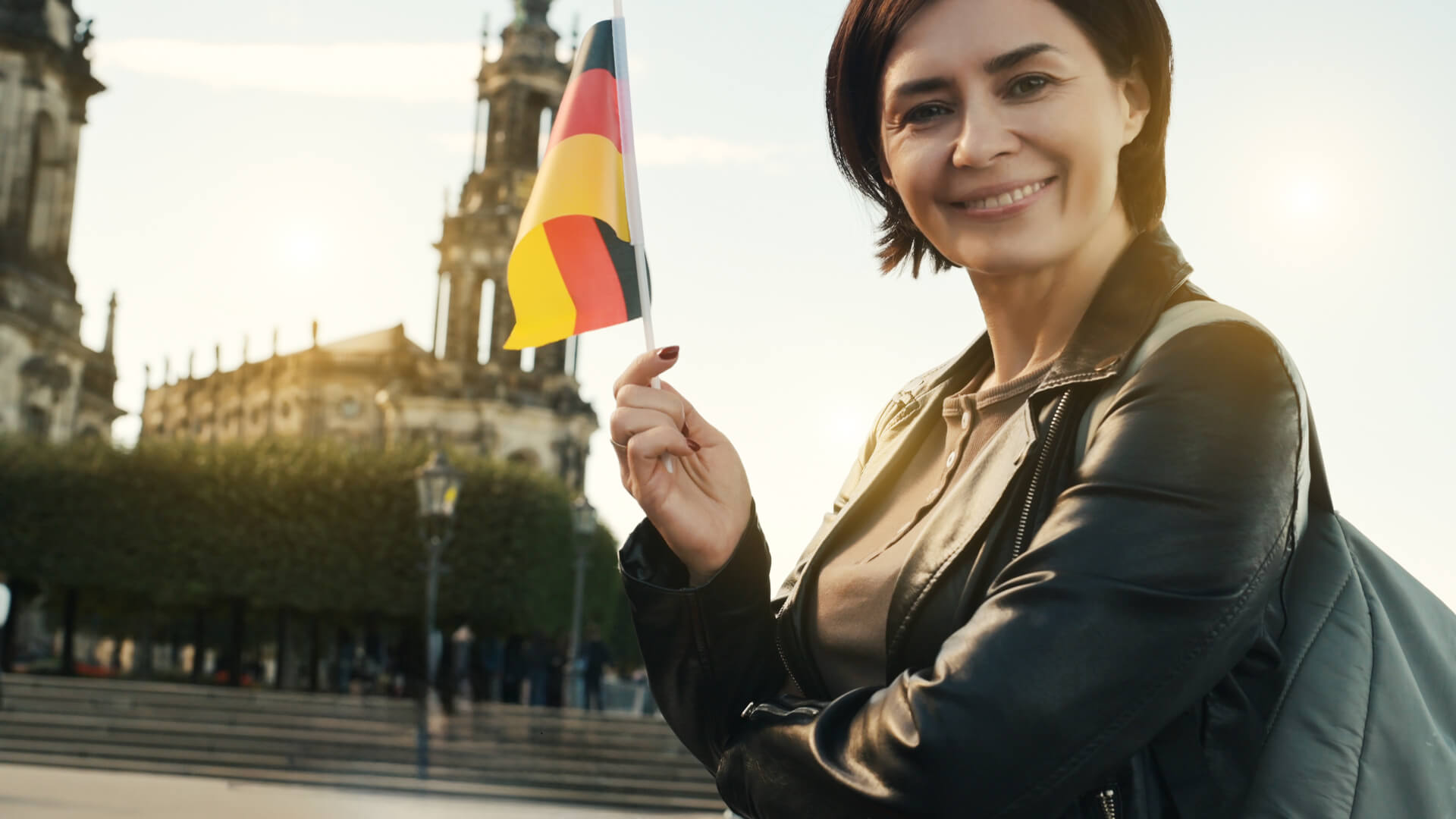 Traveler holding German flag